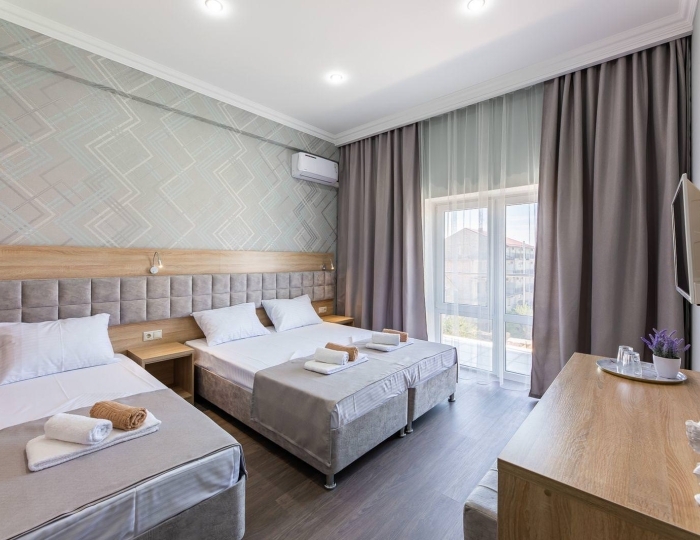 Номер комфорт с 1 односпальной и 1 двуспальной кроватью - Отель ASunrise Hotel / АСанрайз Алахадзы